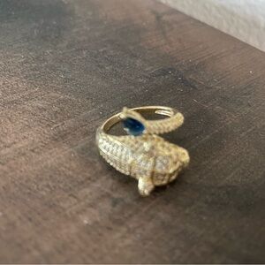 Source Unknown Gold Tone Rhinestone Panther Ring with Blue Accent Stone NWOT